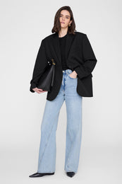 ANINE BING Elly Medium Bucket Bag Grained Leather - Black - on model front second image