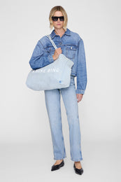 ANINE BING Leo Denim Tote - Lucid Blue - on model front view