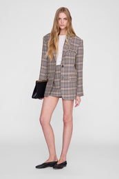 ANINE BING Tierra Skirt - Beige And Navy Checks - on model front second image