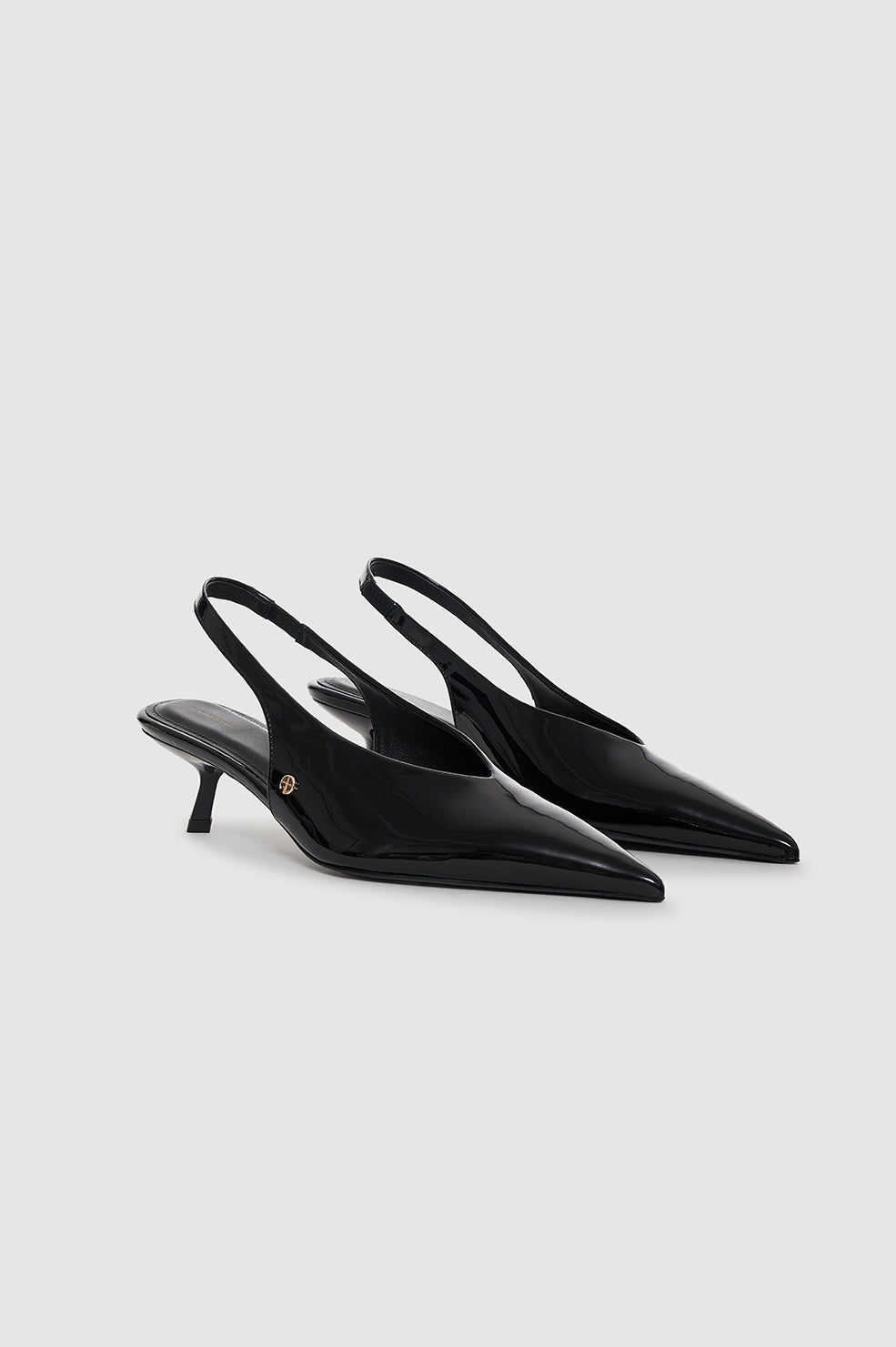 Hilda Slingback Pumps - Black Patent